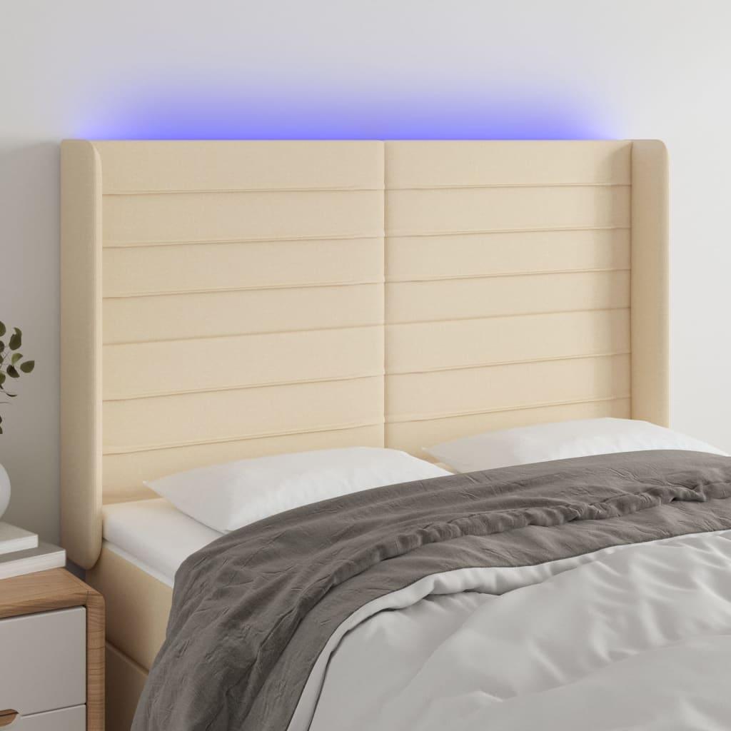 Sengegavl med LED-lys 147x16x118/128 cm - stof, cremefarvet billede
