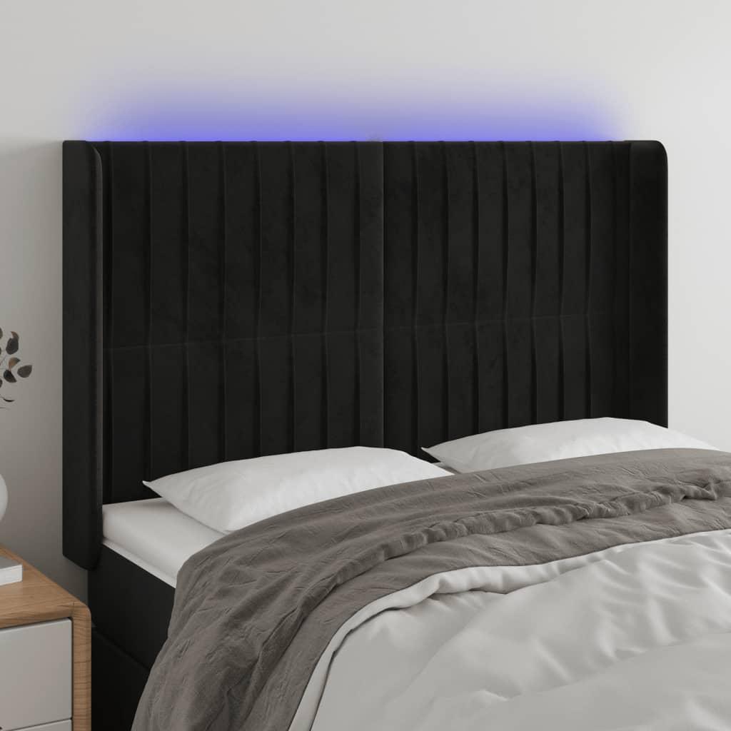 Sengegavl med LED-lys 147x16x118/128 cm fløjl sort billede