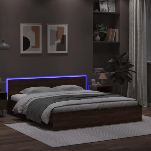 Sengeramme med sengegavl og LED-lys 180x200 cm brunt egetræ