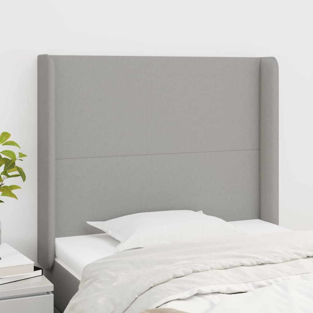 Sengegavl med kanter 83x16x118/128 cm stof lysegrå billede