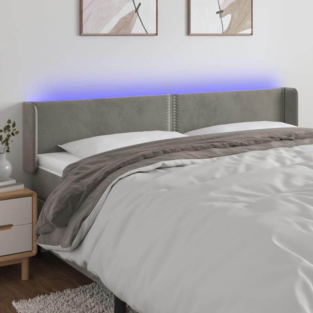 Sengegavl med LED-lys 203x16x78/88 cm fløjl lysegrå billede