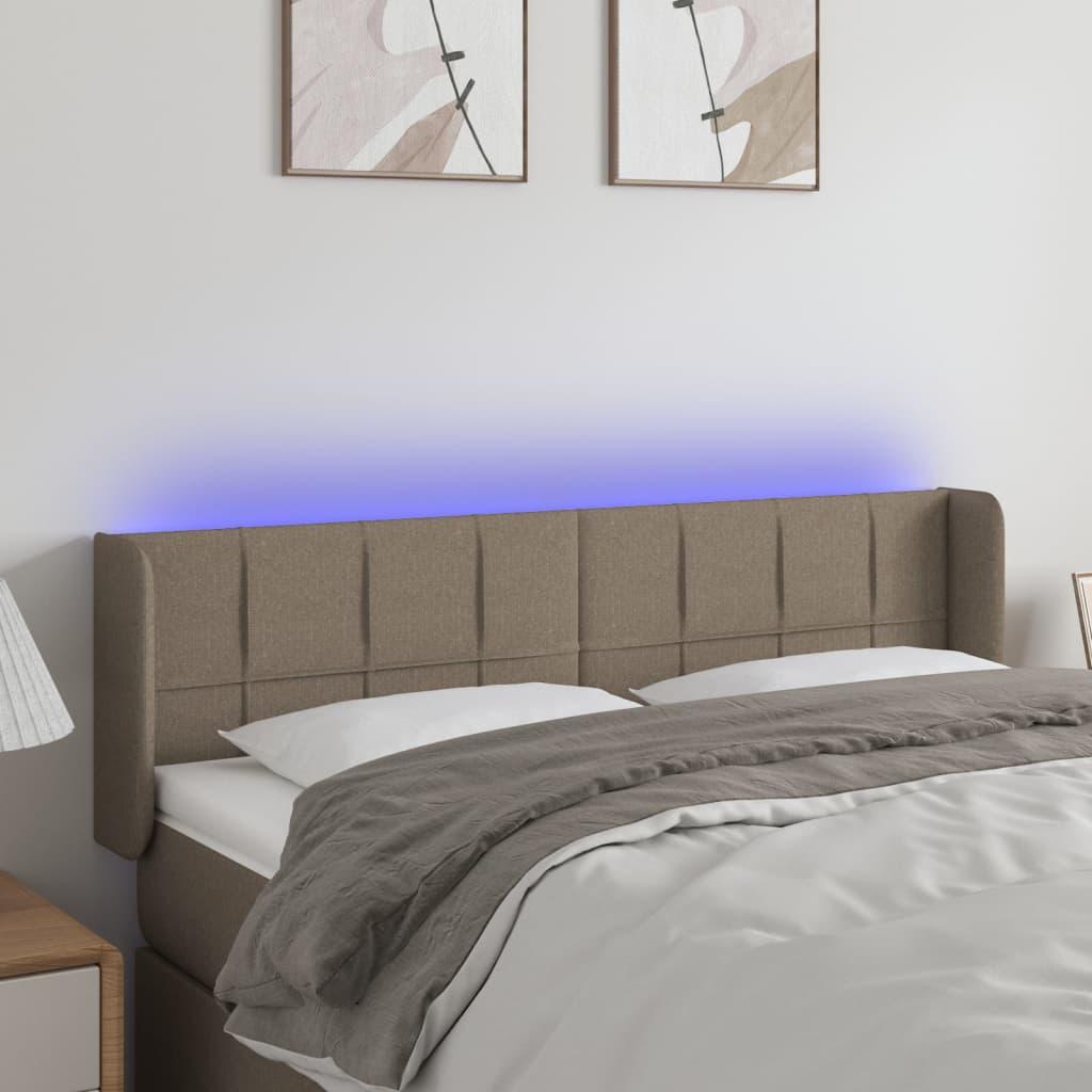 Sengegavl med LED-lys 147x16x78/88 cm - stof, gråbrun billede
