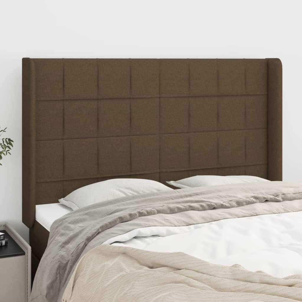 Sengegavl med kanter 147×16×118/128 cm - stof, mørkebrun billede