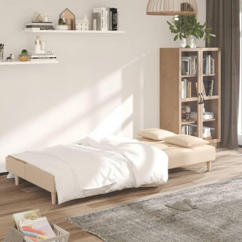 2-personers sovesofa med 2 puder stof cremefarvet