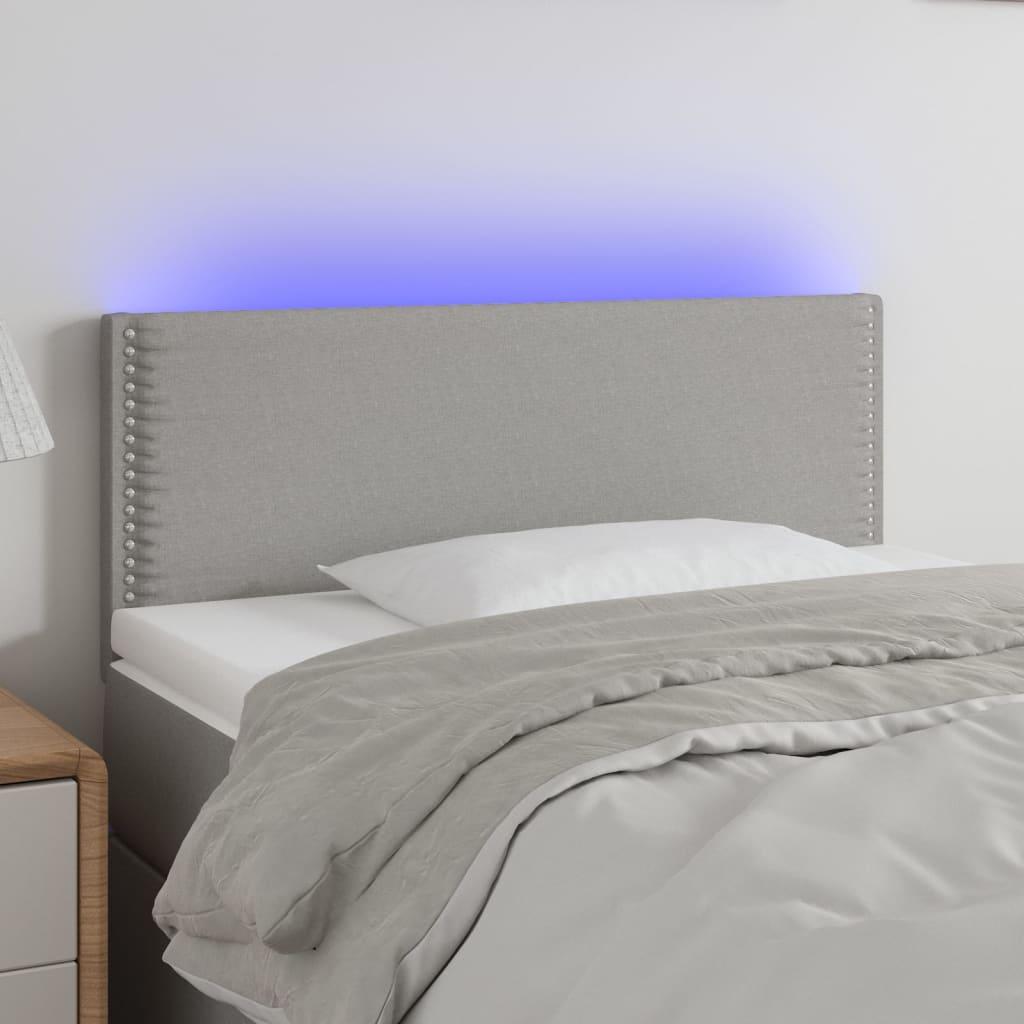 Sengegavl med LED-lys 80x5x78/88 cm stof lysegrå billede