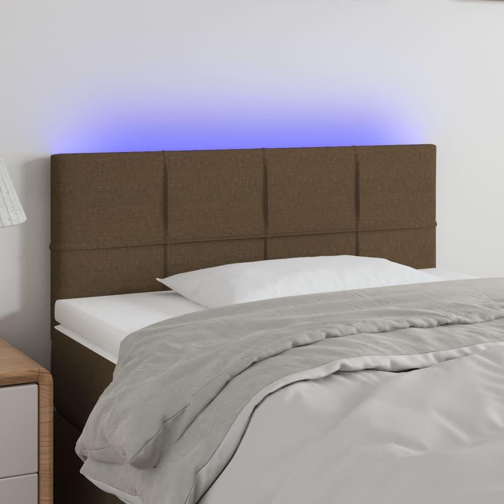 Sengegavl med LED-lys 90x5x78/88 cm stof mørkebrun billede