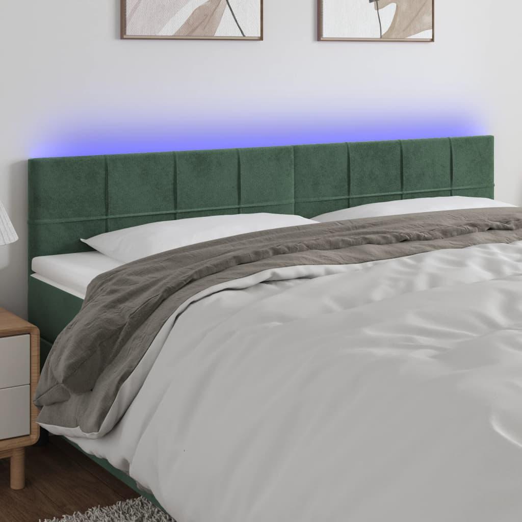 Sengegavl med LED-lys 160x5x78/88 cm fløjl mørkegrøn billede