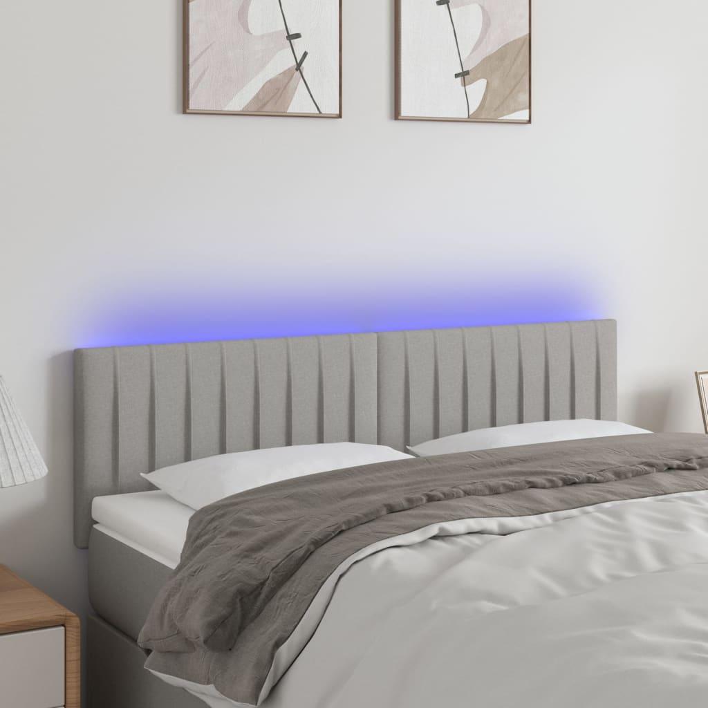 Sengegavl med LED-lys 144x5x78/88 cm stof lysegrå billede