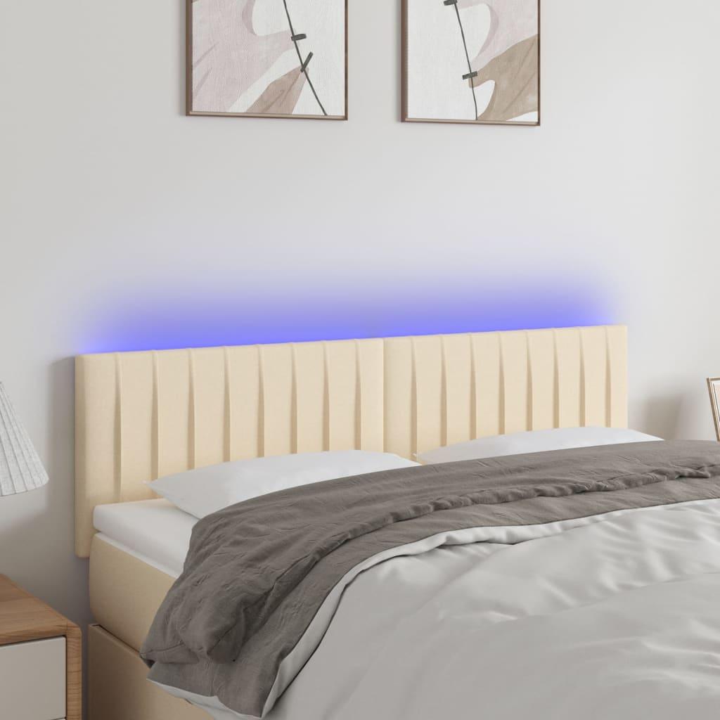 Sengegavl med LED-lys 144x5x78/88 cm stof cremefarvet billede