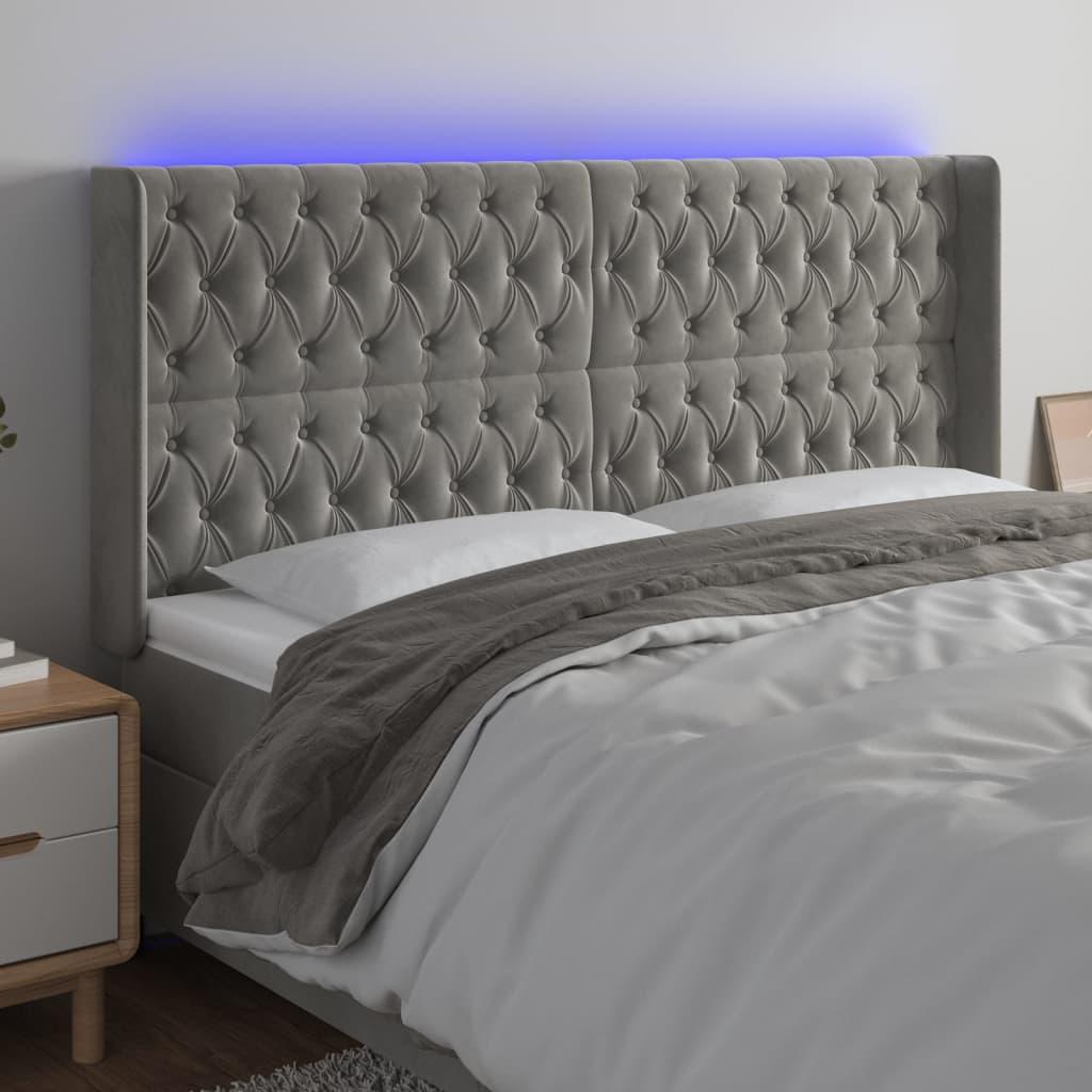 Sengegavl med LED-lys 203x16x118/128 cm - fløjl, lysegrå billede