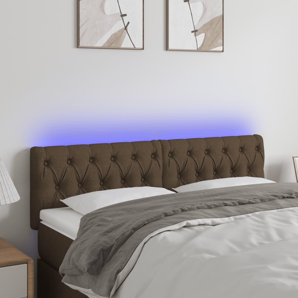 Sengegavl med LED-lys 144x7x78/88 cm stof mørkebrun billede