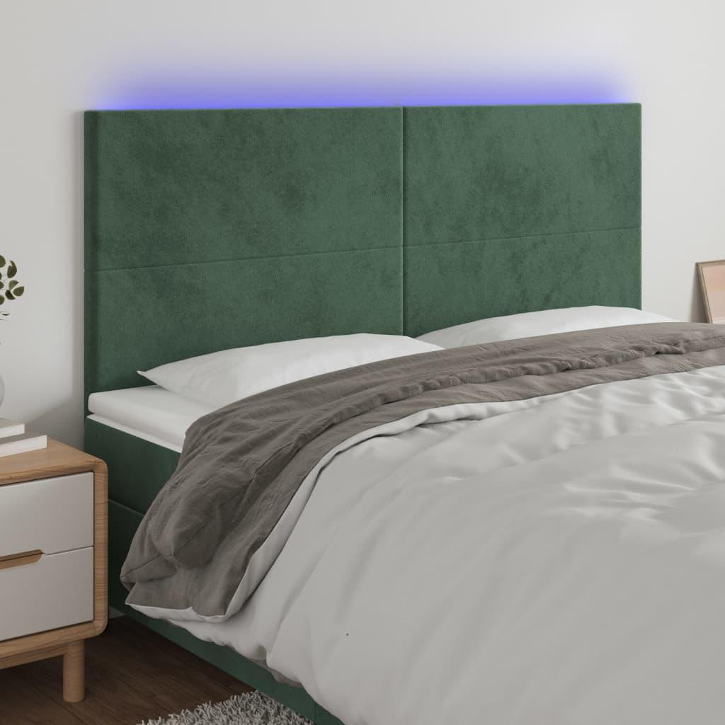 Sengegavl med LED-lys 180x5x118/128 cm fløjl mørkegrøn billede