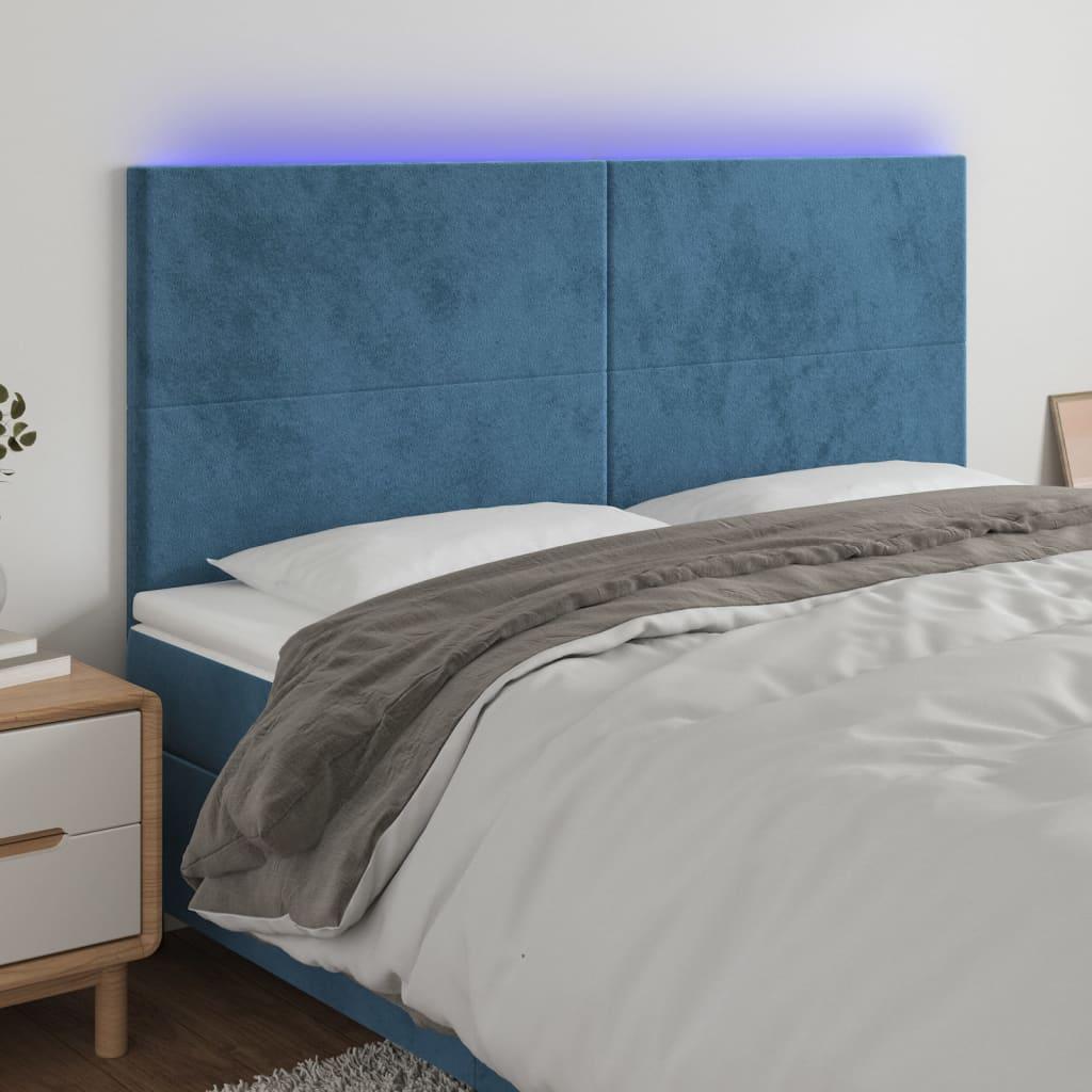 Sengegavl med LED-lys 180x5x118/128 cm fløjl mørkeblå billede