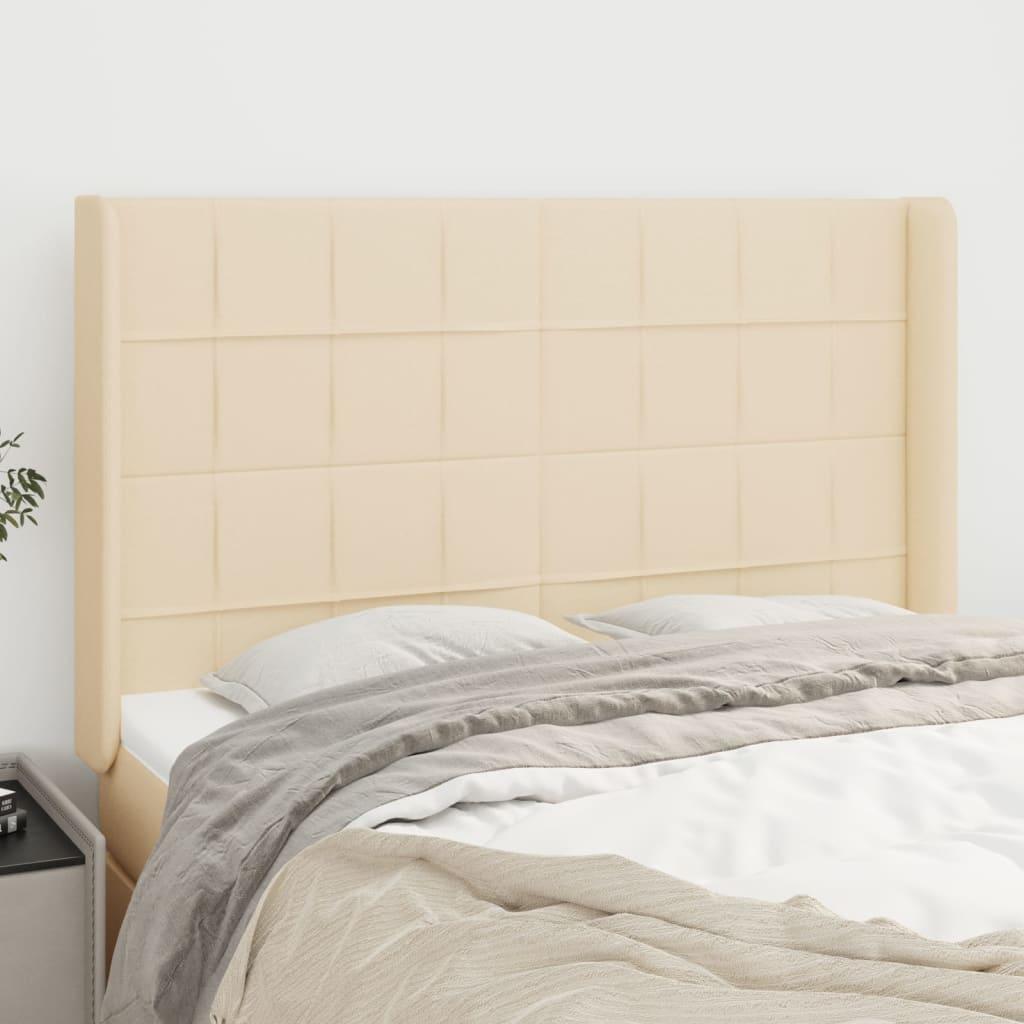 Sengegavl med kanter 147x16x118/128 cm stof cremefarvet billede