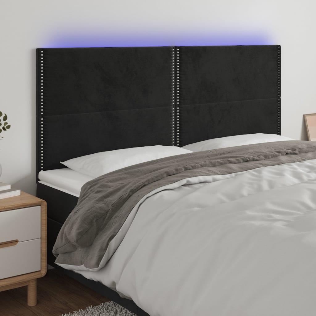 Sengegavl med LED-lys 160x5x118/128 cm fløjl sort billede