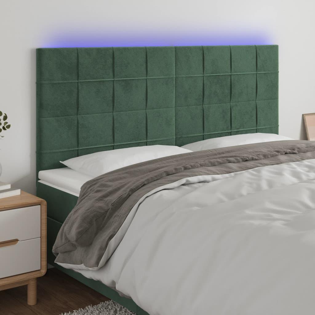 Sengegavl med LED-lys 160x5x118/128 cm fløjl mørkegrøn billede