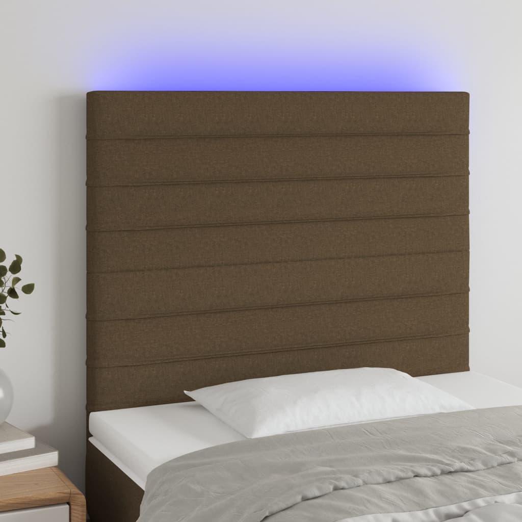 Sengegavl med LED-lys 90x5x118/128 cm stof mørkebrun billede