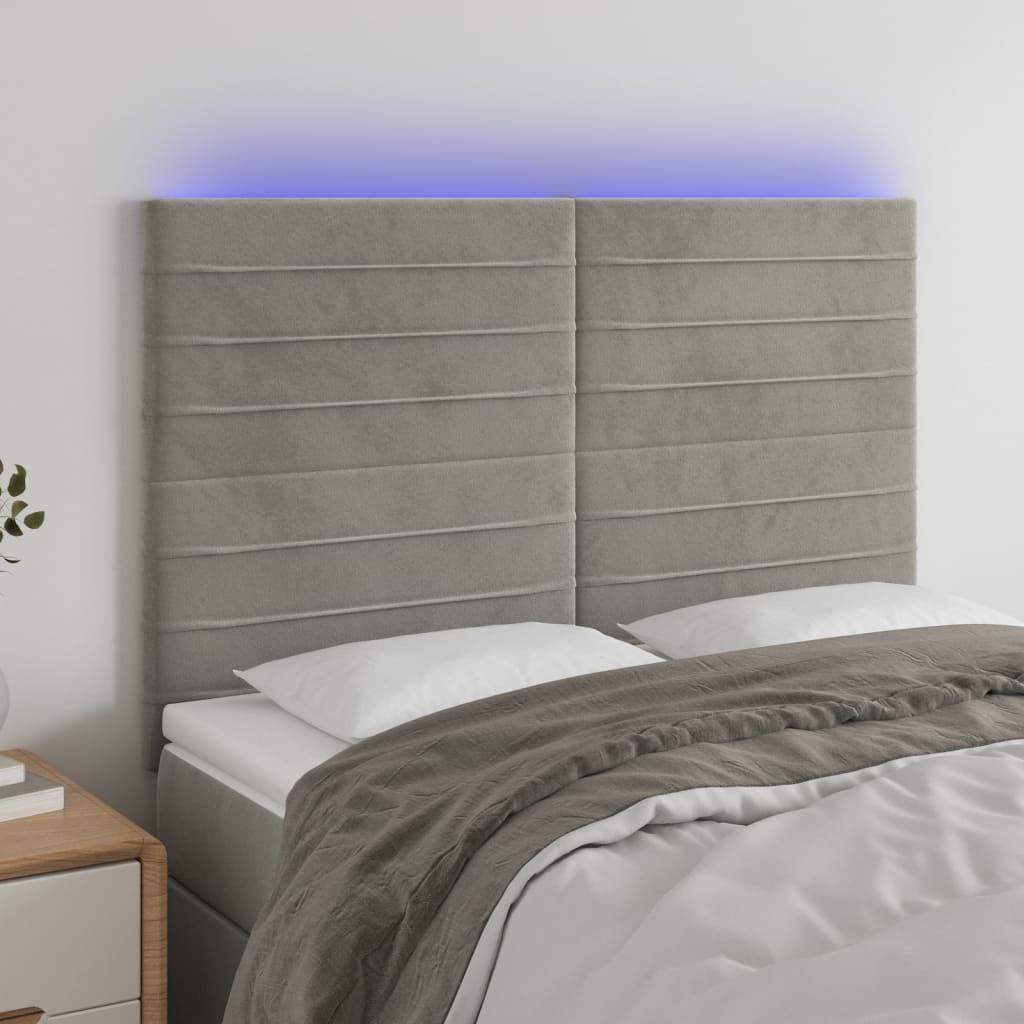 Sengegavl med LED-lys 144x5x118/128 cm fløjl lysegrå billede