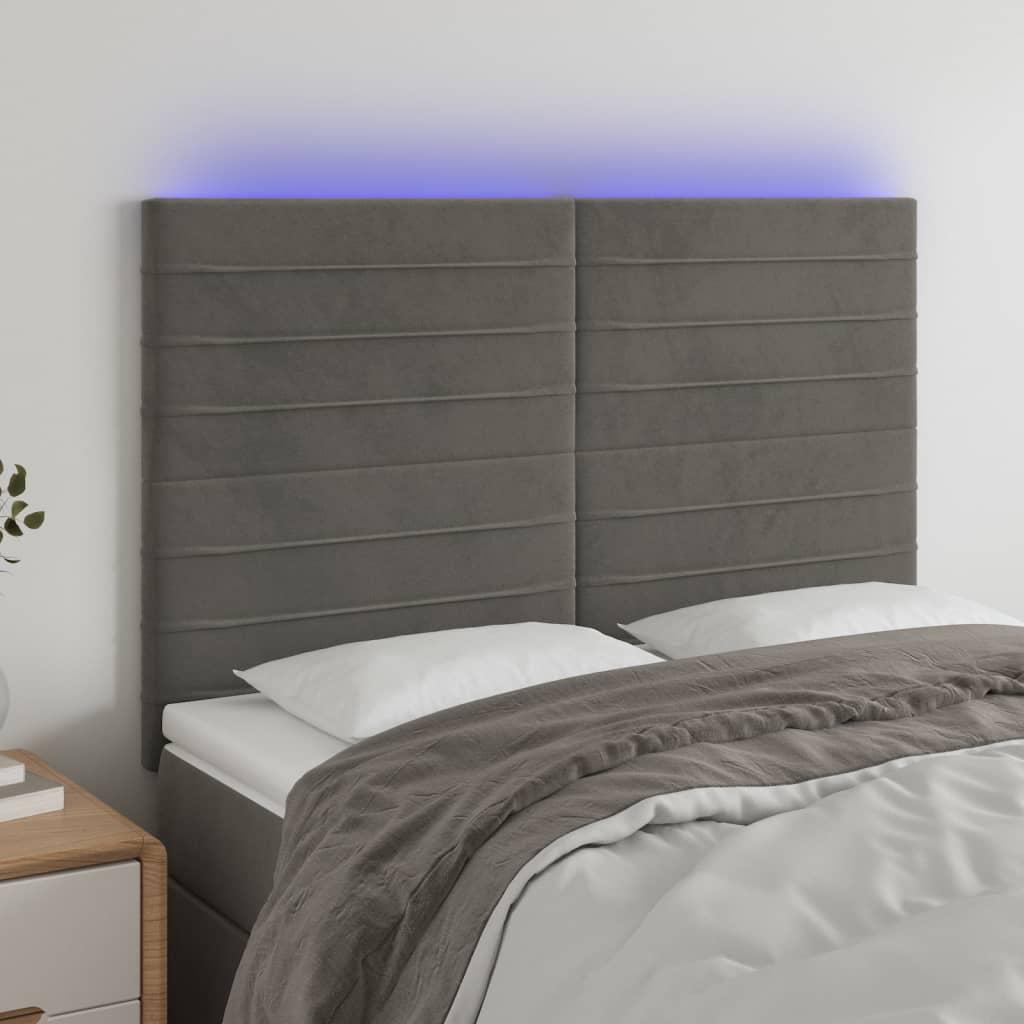 Sengegavl med LED-lys 144x5x118/128 cm fløjl mørkegrå billede