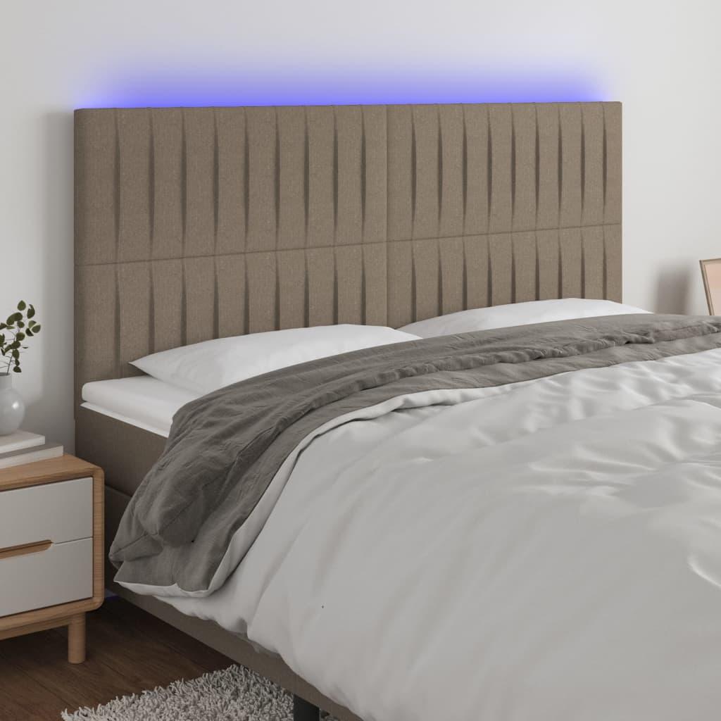 Sengegavl med LED-lys 160x5x118/128 cm stof gråbrun billede