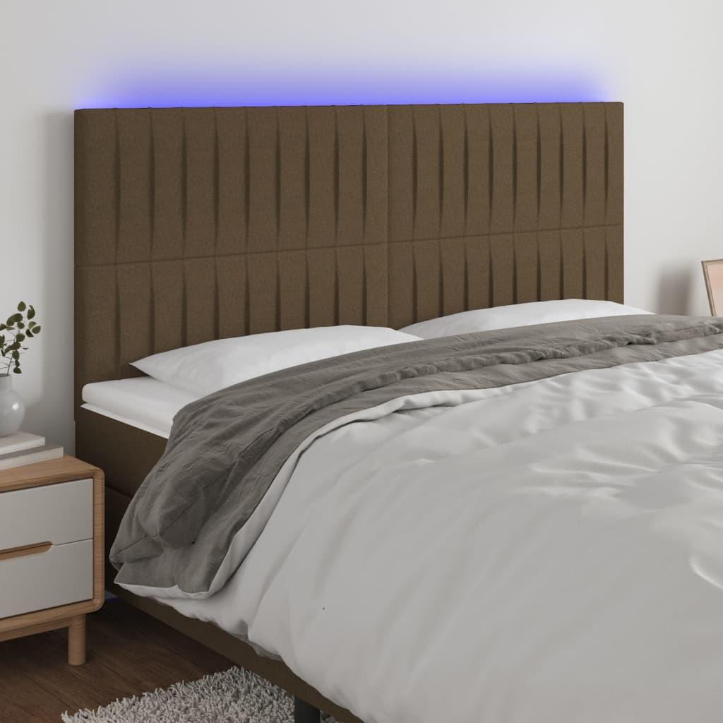 Sengegavl med LED-lys 200x5x118/128 cm stof mørkebrun billede