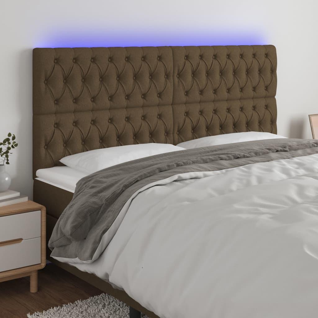Sengegavl med LED-lys 180x7x118/128 cm stof mørkebrun billede