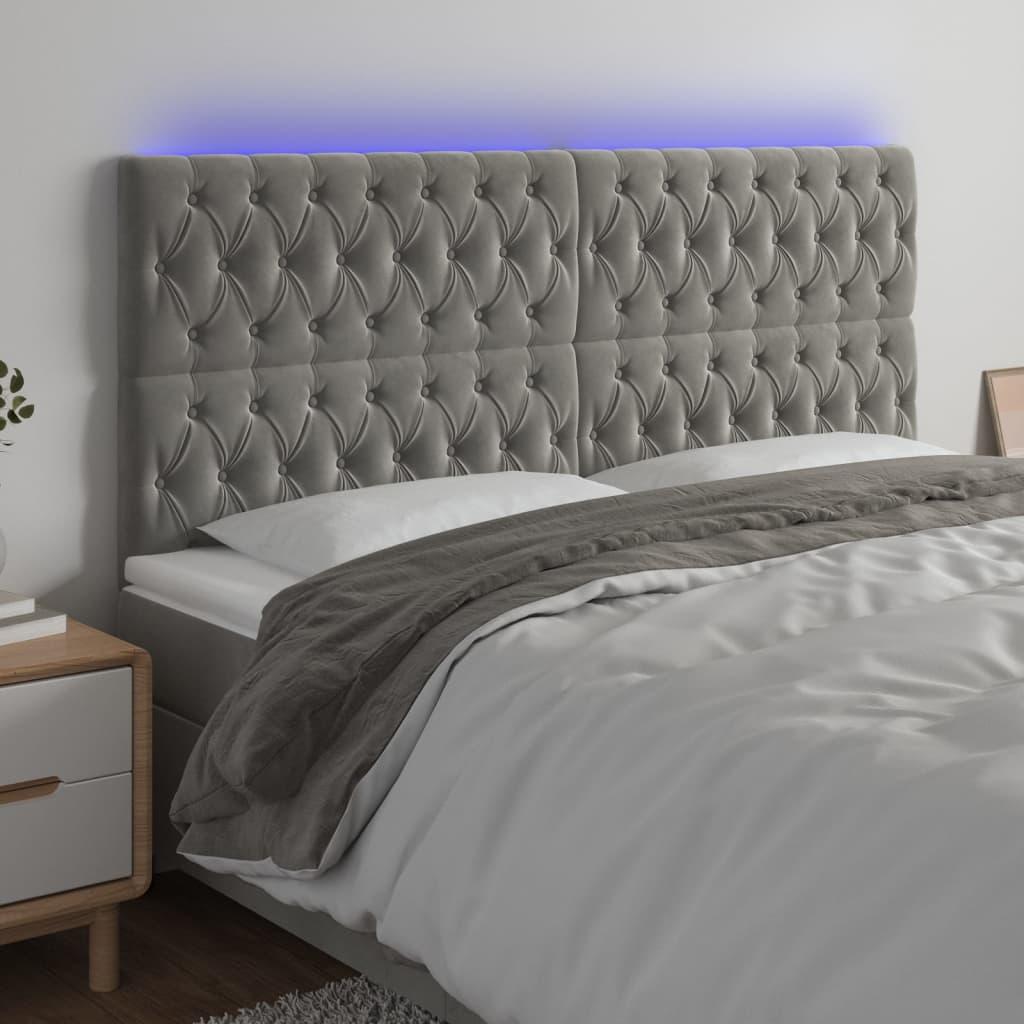 Sengegavl med LED-lys 200x7x118/128 cm fløjl lysegrå billede
