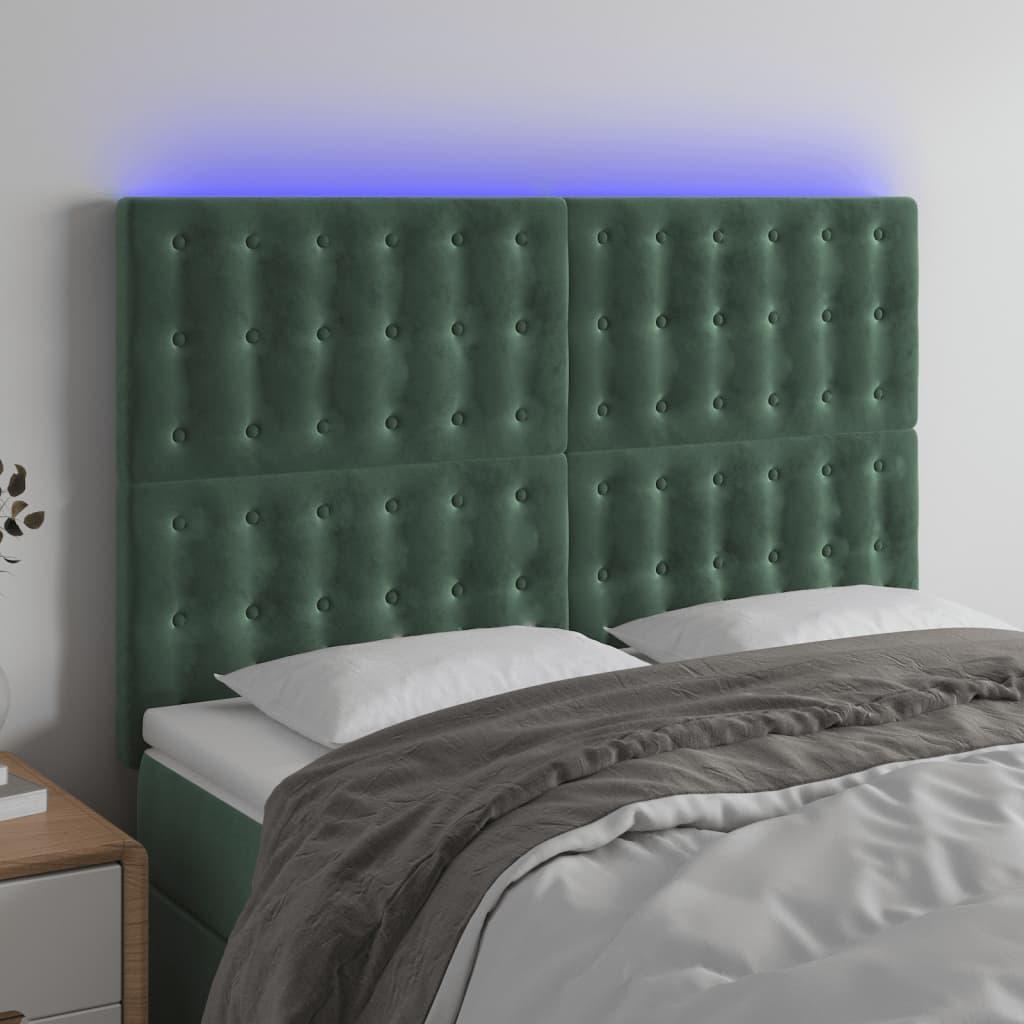 Sengegavl med LED-lys 144x5x118/128 cm fløjl mørkegrøn billede