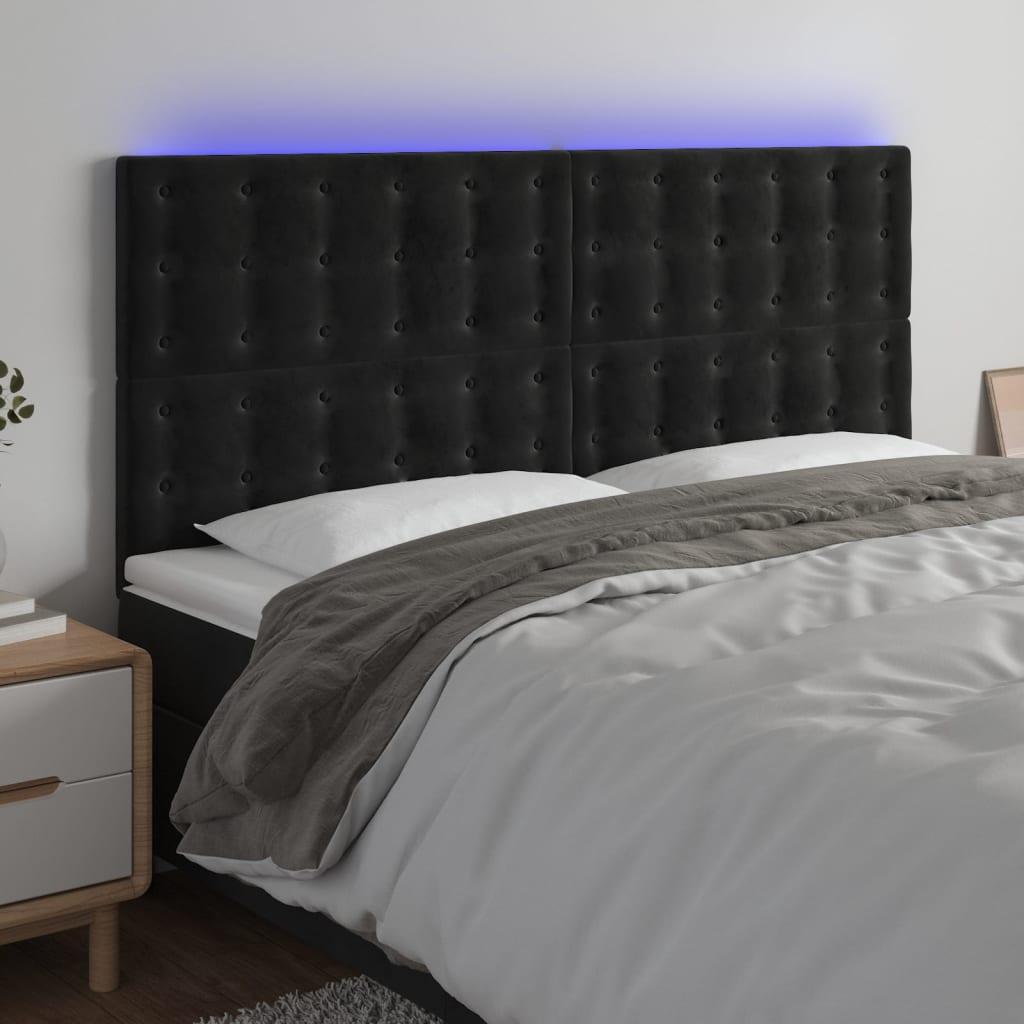 Sengegavl med LED-lys 160x5x118/128 cm fløjl sort billede