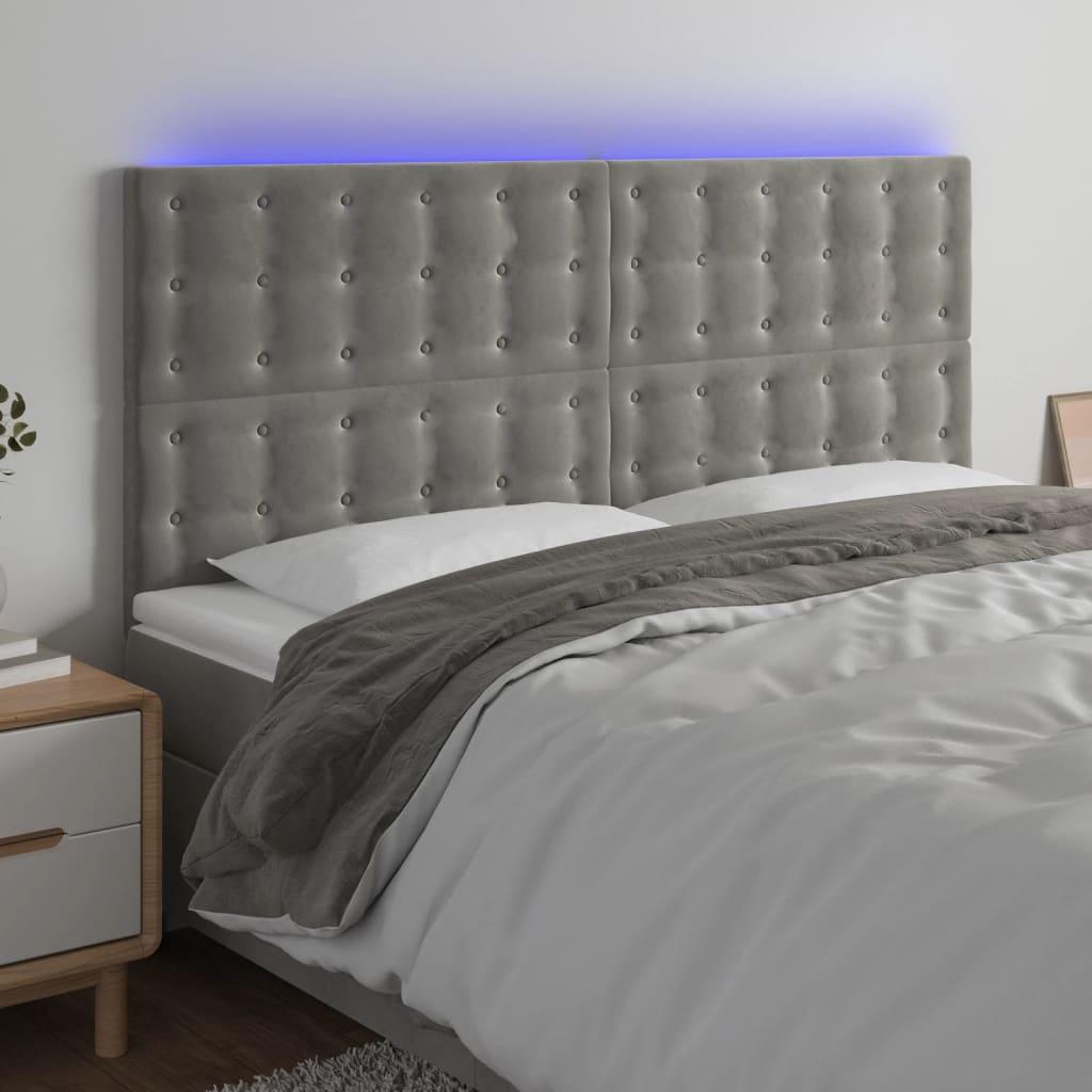 Sengegavl med LED-lys 200x5x118/128 cm fløjl lysegrå billede