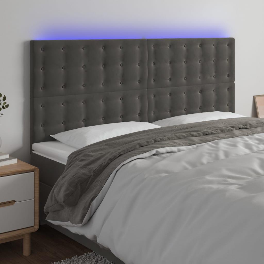 Sengegavl med LED-lys 200x5x118/128 cm fløjl mørkegrå billede