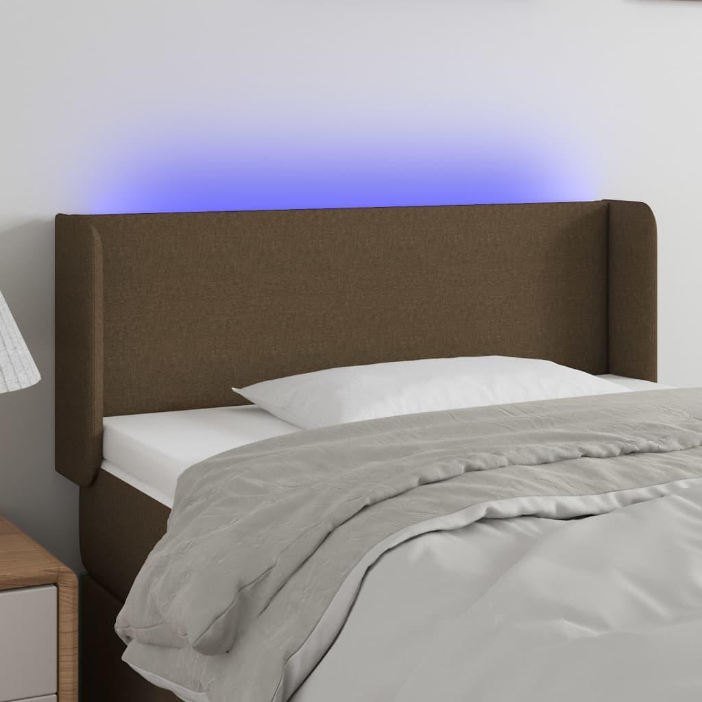 Sengegavl med LED-lys 93x16x78/88 cm stof mørkebrun billede