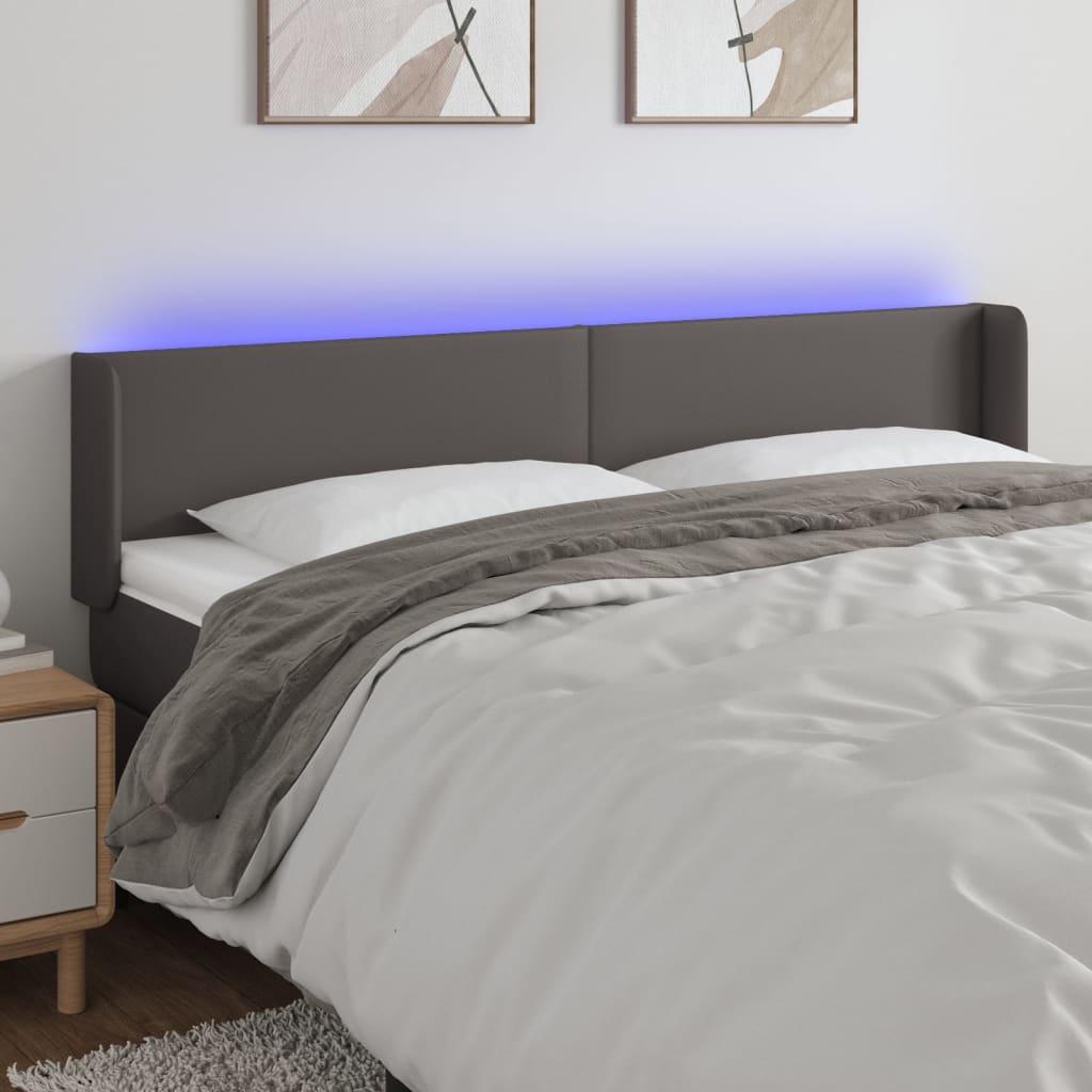 Sengegavl med LED-lys 203x16x78/88 cm kunstlæder grå billede