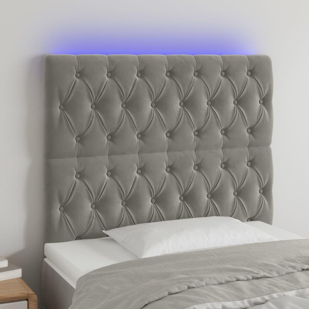Sengegavl med LED-lys 100x7x118/128 cm fløjl lysegrå billede