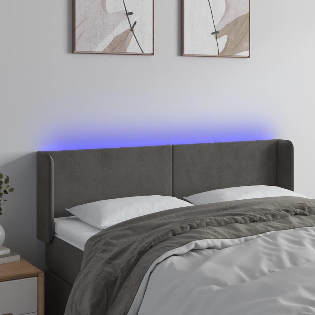 Sengegavl med LED-lys 147x16x78/88 cm fløjl mørkegrå billede
