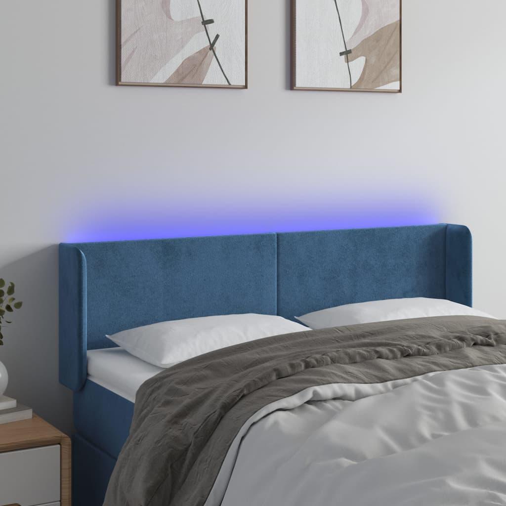 Sengegavl med LED-lys 147x16x78/88 cm fløjl mørkeblå billede