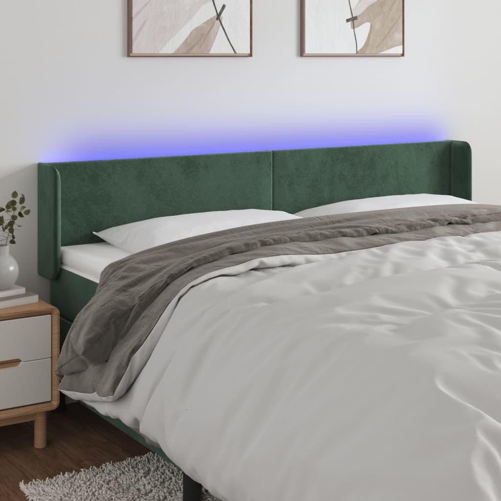Sengegavl med LED-lys 163x16x78/88 cm fløjl mørkegrøn billede