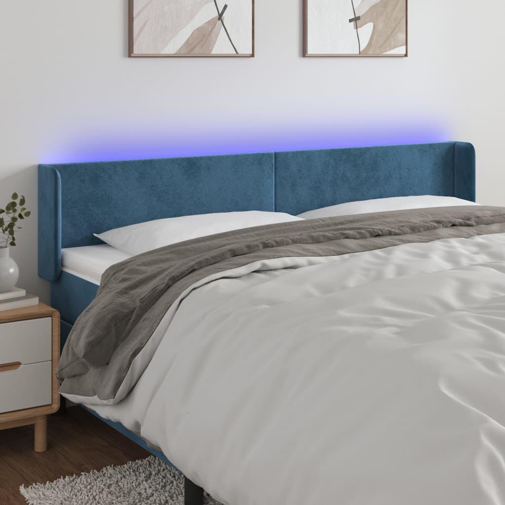 Sengegavl med LED-lys 183x16x78/88 cm fløjl mørkeblå billede