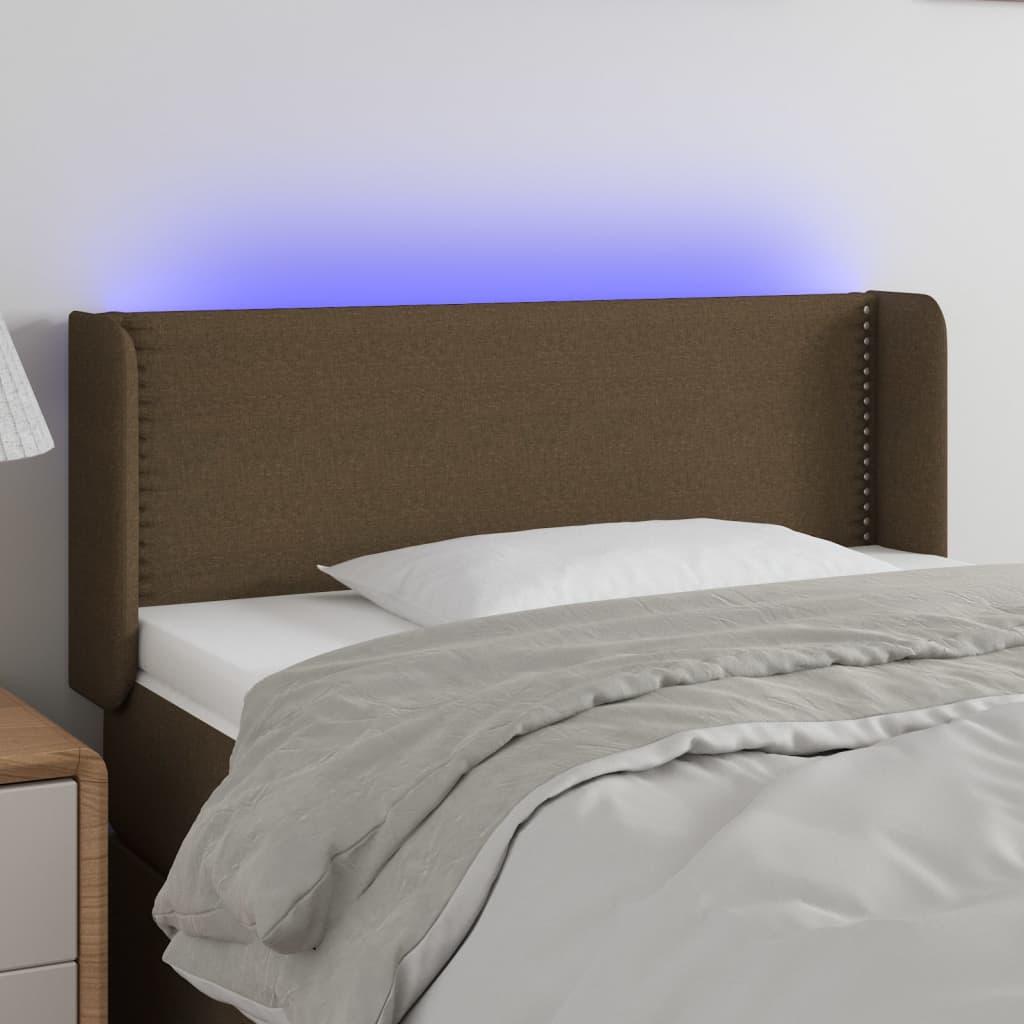 Sengegavl med LED-lys 103x16x78/88 cm stof mørkebrun billede
