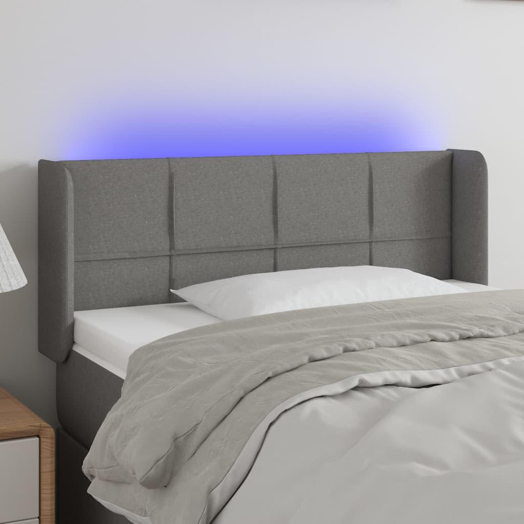 Sengegavl med LED-lys 83x16x78/88 cm stof mørkegrå billede