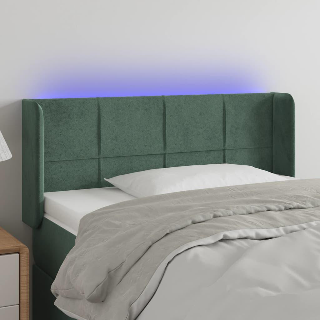 Sengegavl med LED-lys 93x16x78/88 cm fløjl Mørkegrøn billede