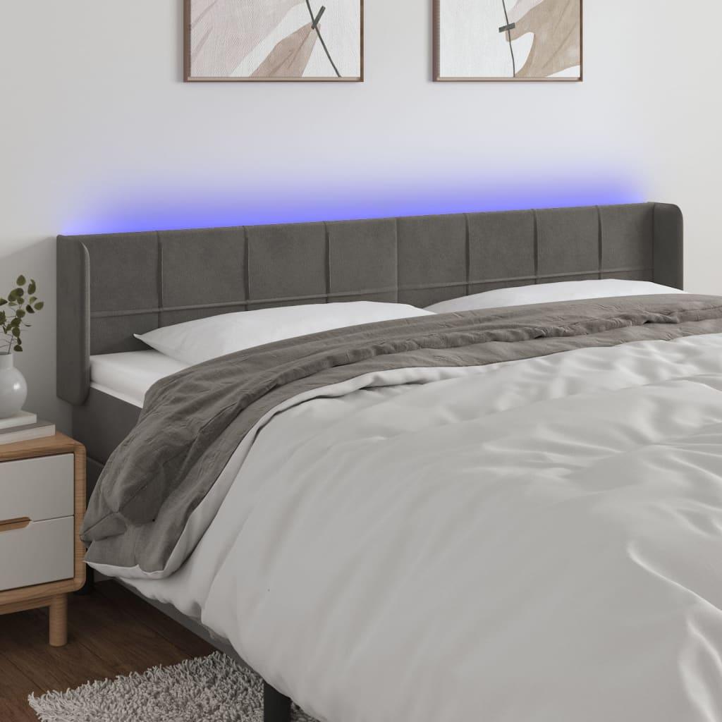 Sengegavl med LED-lys 163x16x78/88 cm fløjl mørkegrå billede