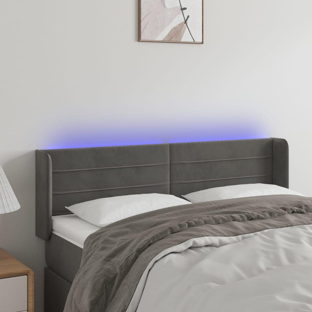 Sengegavl med LED-lys 147x16x78/88 cm fløjl mørkegrå billede