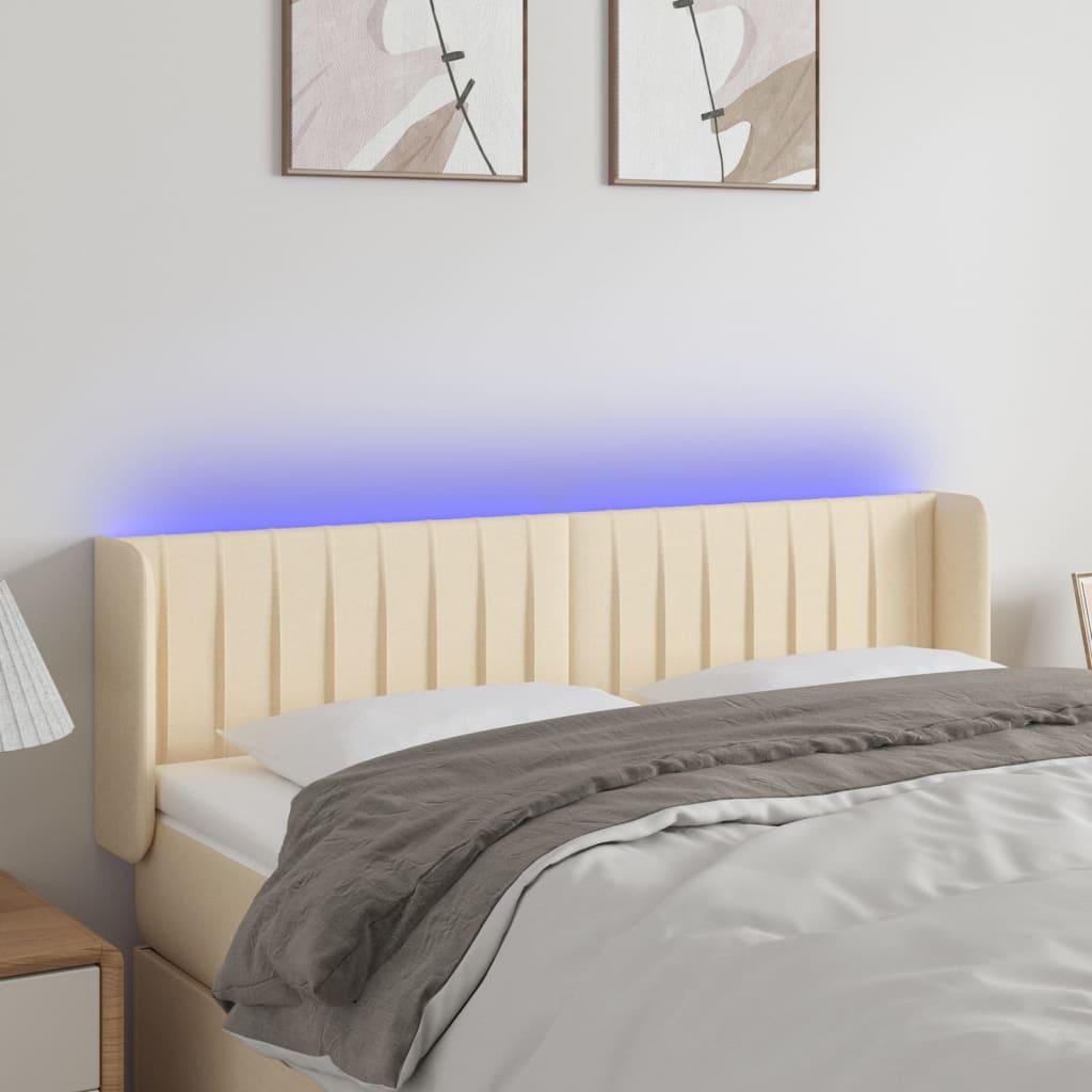 Sengegavl med LED-lys 147x16x78/88 cm - stof, cremefarvet billede