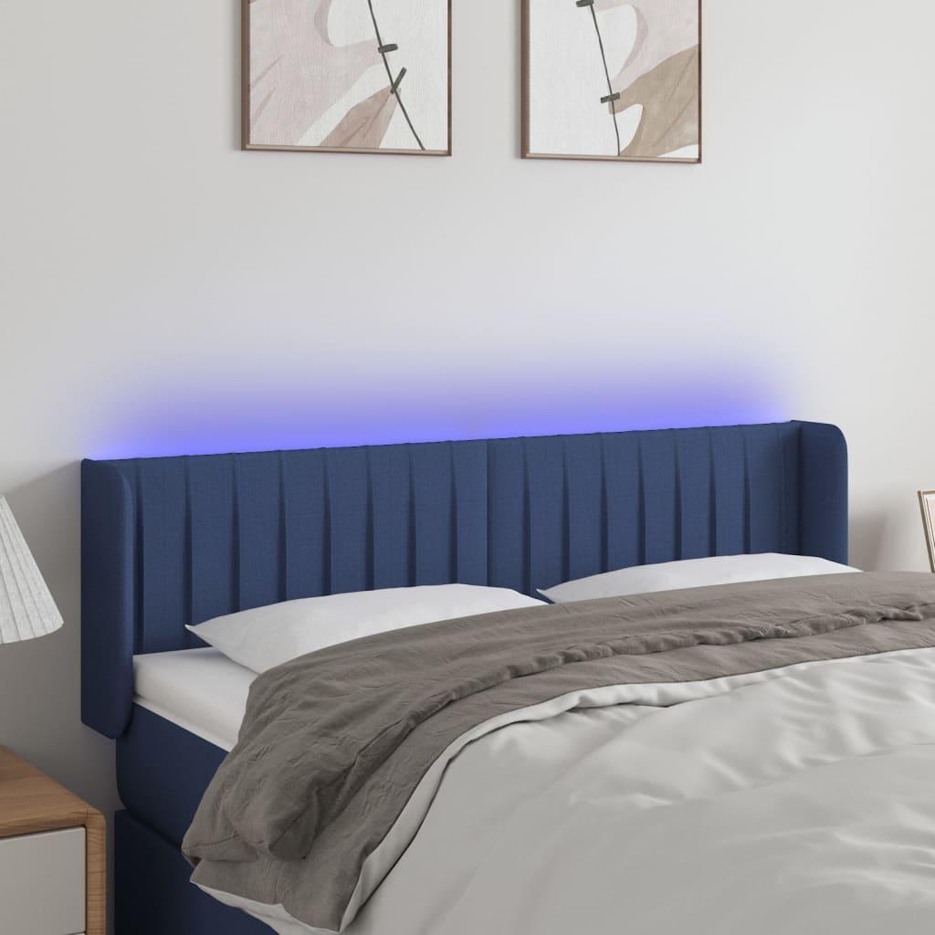 Sengegavl med LED-lys 147x16x78/88 cm stof blå billede