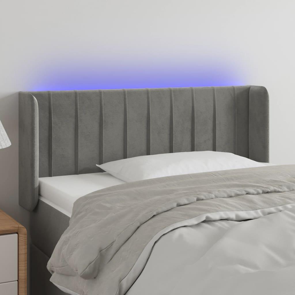 Sengegavl med LED-lys 103x16x78/88 cm fløjl lysegrå billede