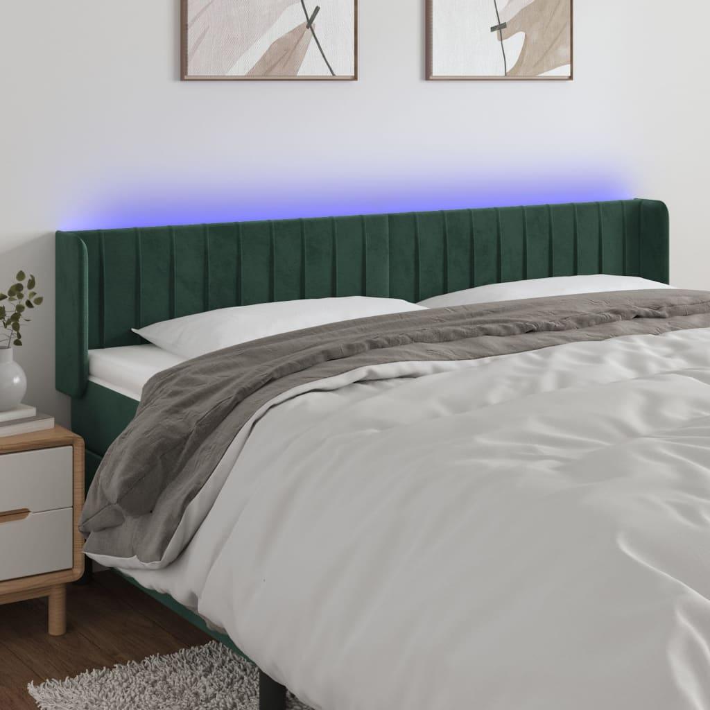 Sengegavl med LED-lys 163x16x78/88 cm fløjl mørkegrøn billede