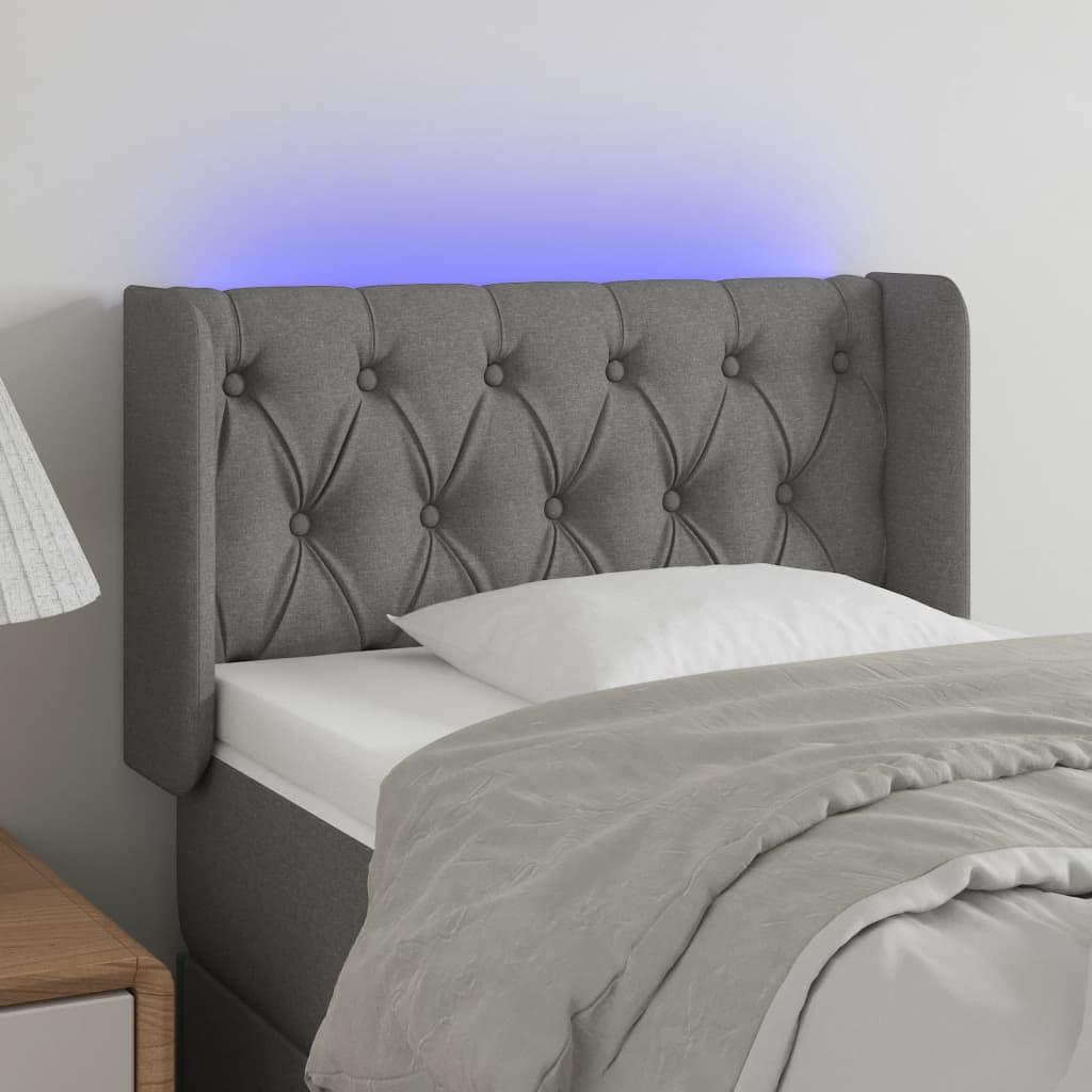 Sengegavl med LED-lys 83x16x78/88 cm stof mørkegrå billede