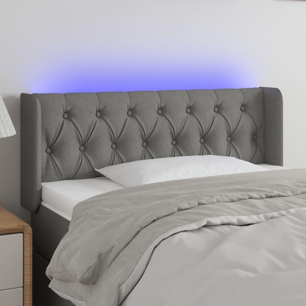 Sengegavl med LED-lys 103x16x78/88 cm stof mørkegrå billede
