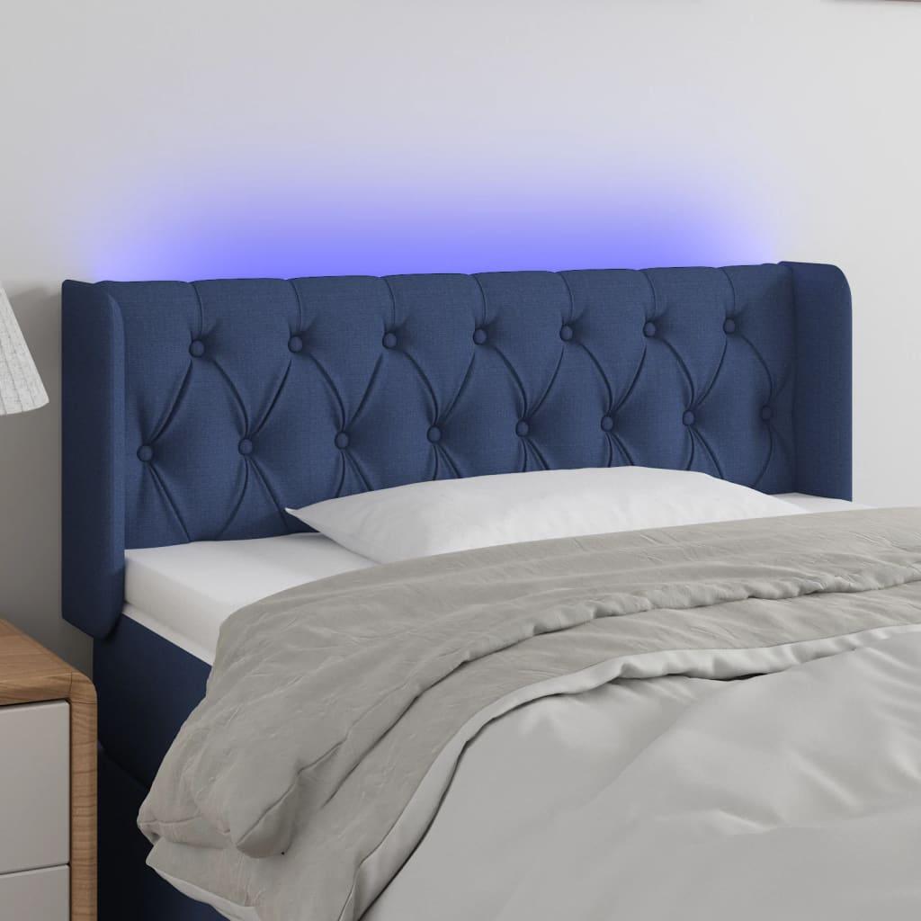 Sengegavl med LED-lys 103x16x78/88 cm stof blå billede